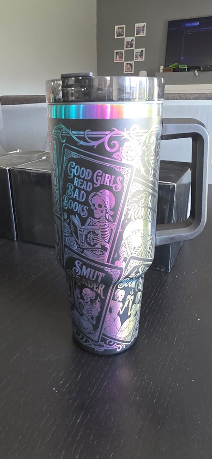 a black and purple mug with a handle