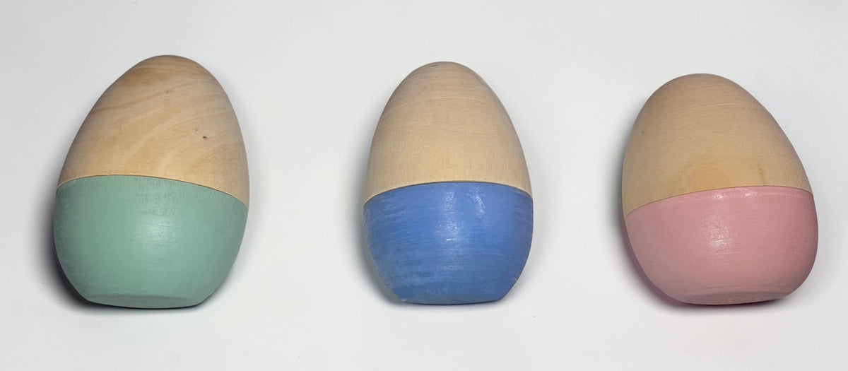 a group of eggs painted in different colors
