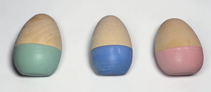 a group of eggs painted in different colors