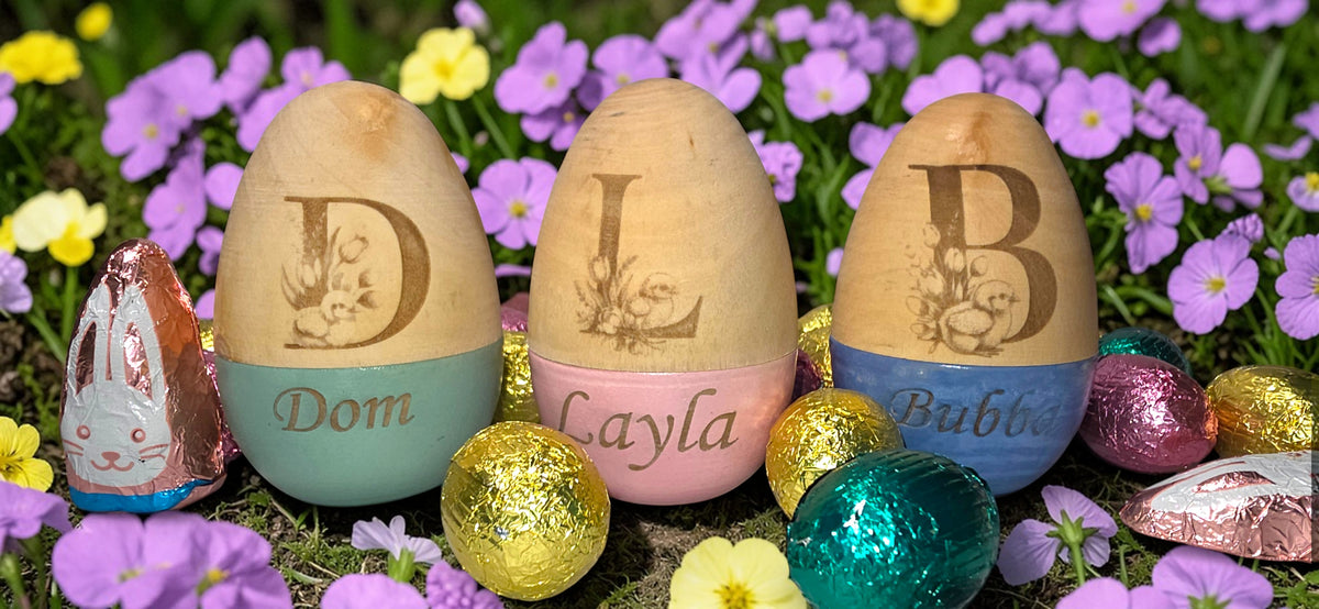 a group of eggs with name engraved on them