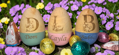 a group of eggs with name engraved on them