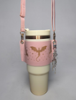 a cup with a strap around it