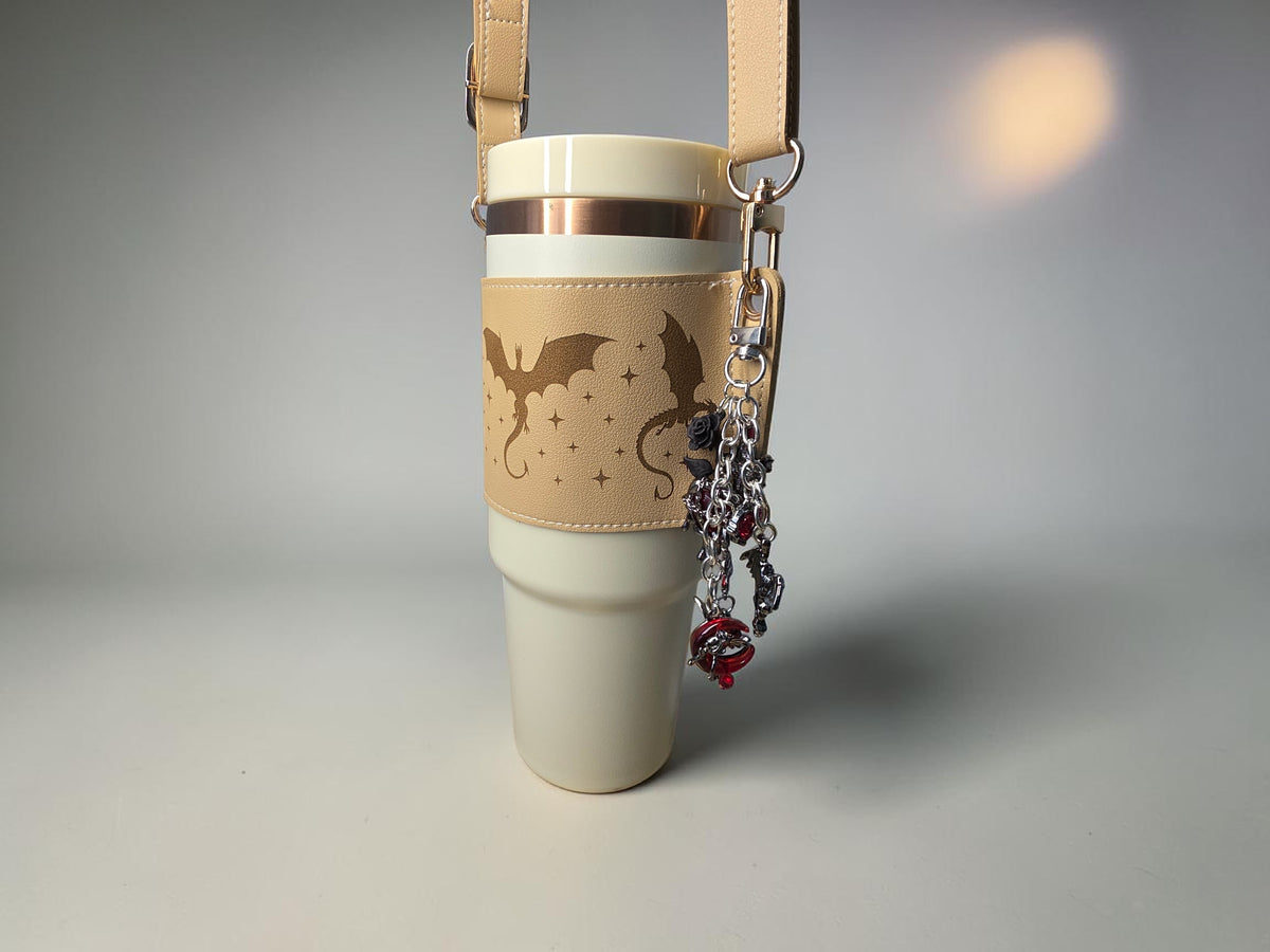 a white cup with a strap attached to it