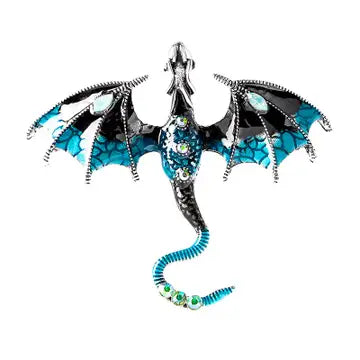 a blue and black dragon brooch