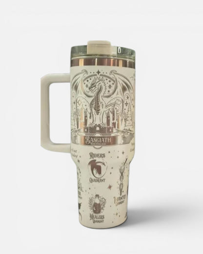 a white and gold travel mug