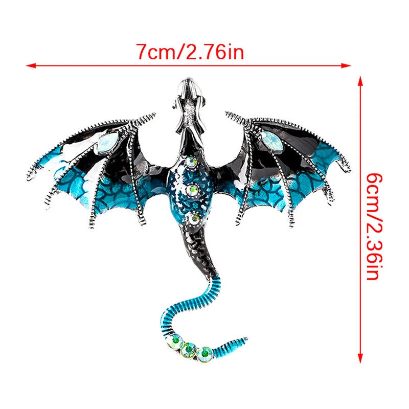a blue and black dragon brooch